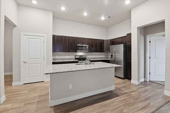 Building Photo - $1,640.95, 2-bed, 2-bath condo located in Aurora.