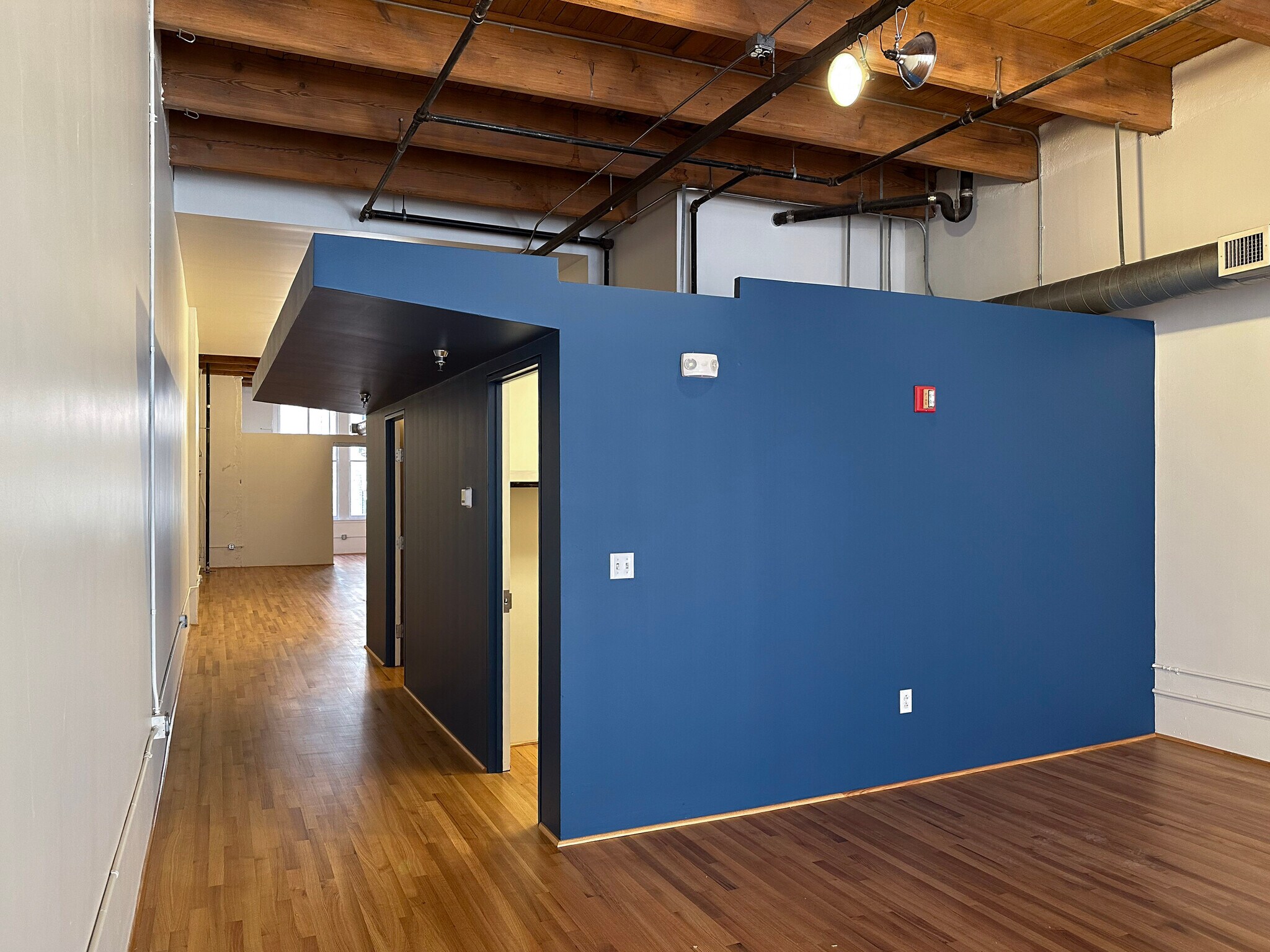 Fully sprinklered and retaining the exposed beams throughout - 945 Liberty Ave