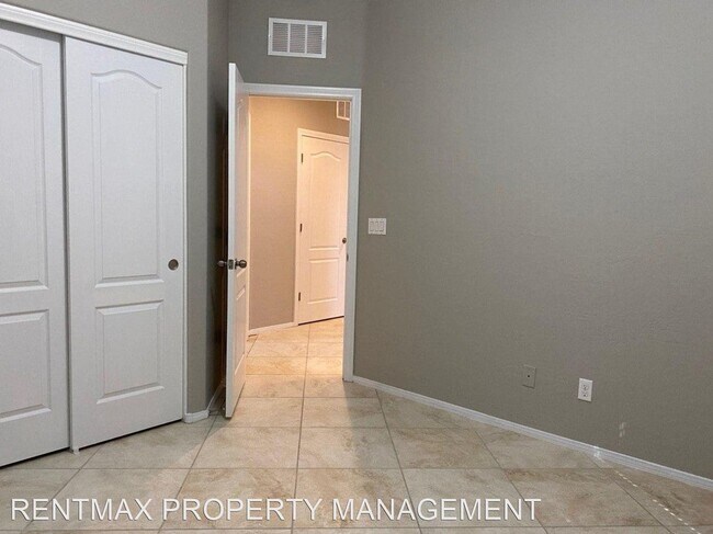 Building Photo - 4 br, 2.5 bath House - 688 CALAMUS PALMS PL