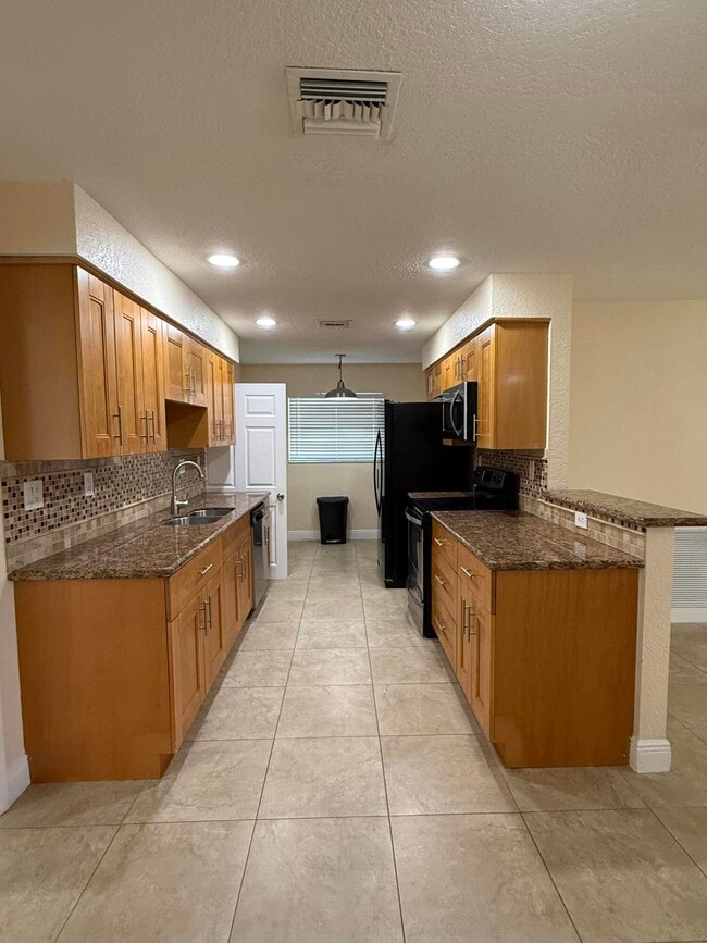 Building Photo - 7302 NW 57th Ct