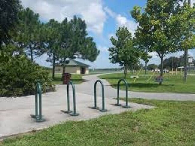 Building Photo - Move-In Ready 2BR/2BA Villa with Den + 2-Car Garage | Lake Nona Adjacent | Suncrest at St. Cloud