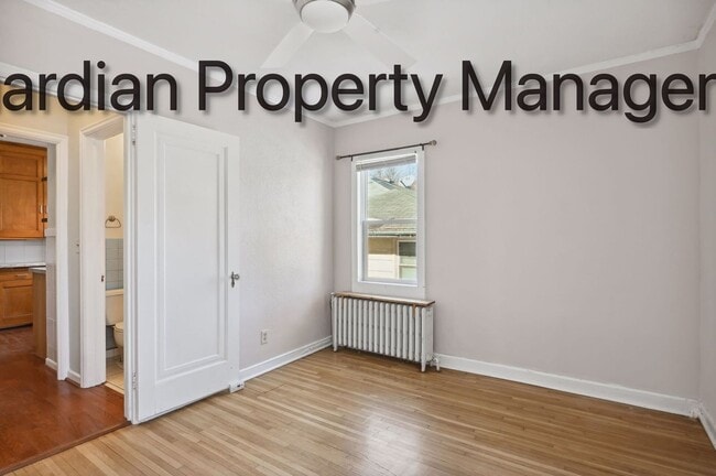 Building Photo - Linden Hills Side By Side, Hardwood Floors, Attached Garage, New Efficient Heating System, Pets W...