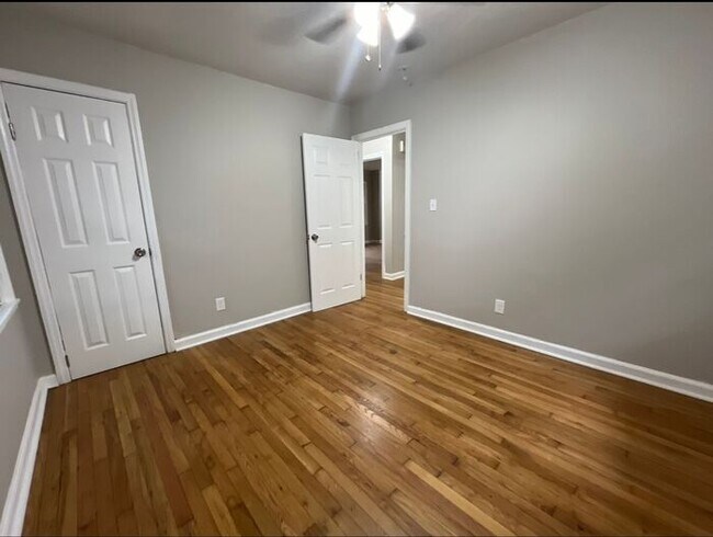Building Photo - COMING SOON: Classic charm, peaceful living, your Forest Park retreat awaits in this spacious 3-b...