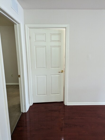 Downstairs bedroom on the left/Downstairs bathroom ahead - 631 N 44th St
