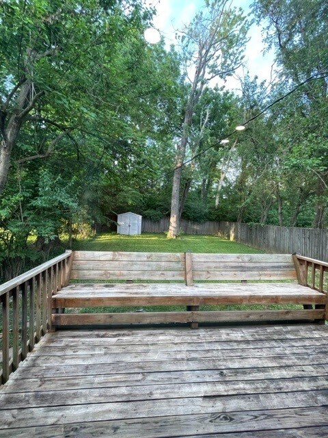 Deck with built in seating. - 214 E Vermilya Ave