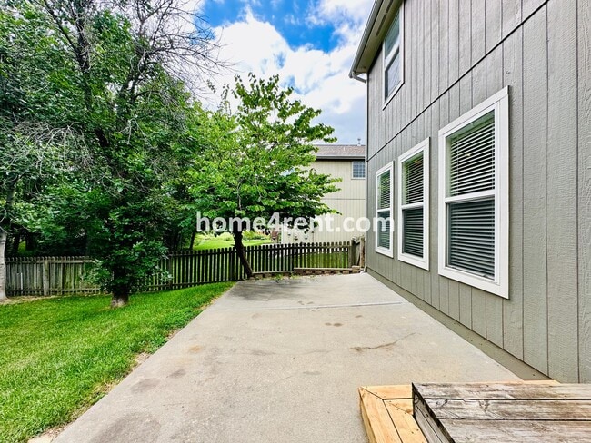 Building Photo - Beautiful Four-Bedroom Home with Three Car Garage, Wood Floors, Finished Basement and a Fenced Ya...