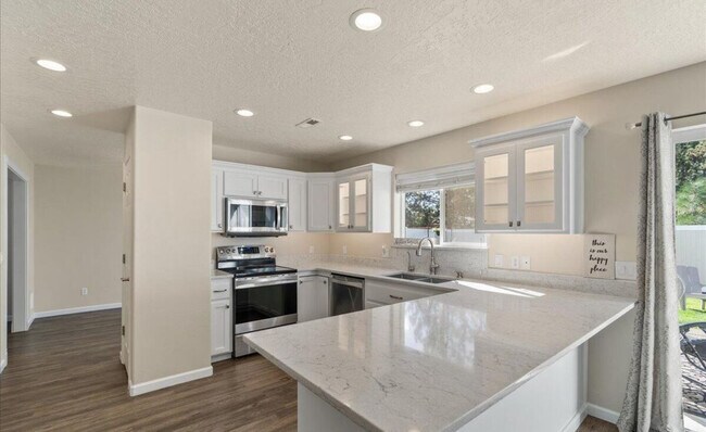 Building Photo - 4995 N Tasman Dr