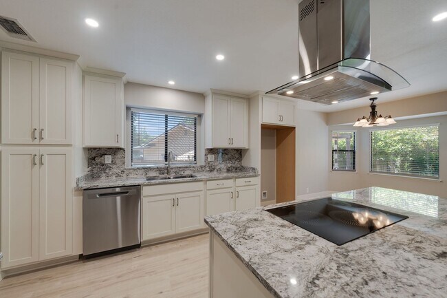 Building Photo - Bright and Stylish 4BD/2BA Home with 3 Car...