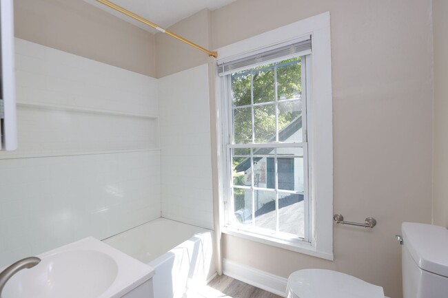Building Photo - Charming 4-Bedroom Home with Hardwood Floo...
