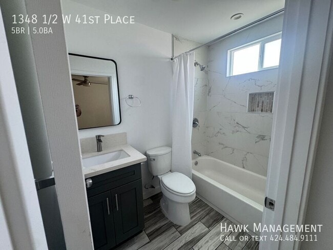 Building Photo - 1348 1/2 W 41st Place-