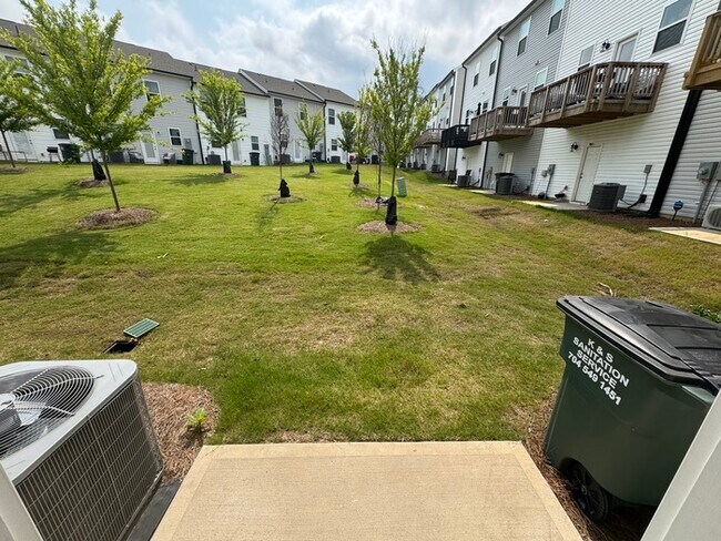 Building Photo - Corner townhome with three bedrooms 2 1/2 ...