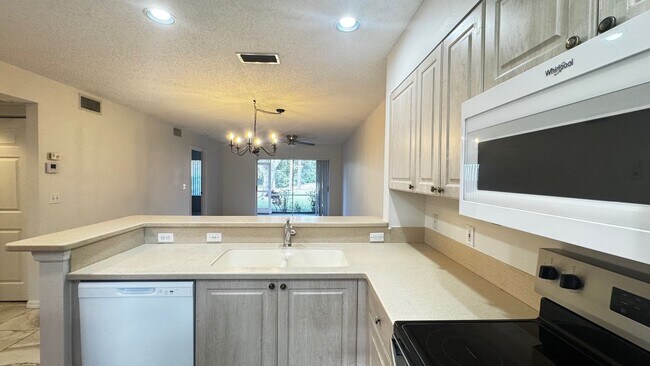 Building Photo - Ground Floor Condo at Magnolia Place