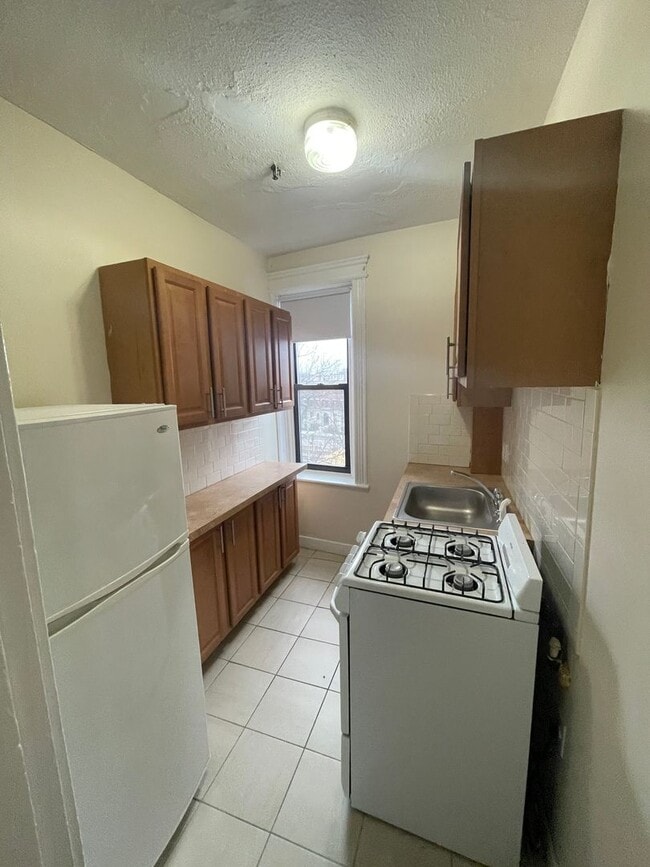 Building Photo - FREE MONTH PACKARDS CORNER, Best location in Allston, T stop and Grocery In front, Easy choice an...