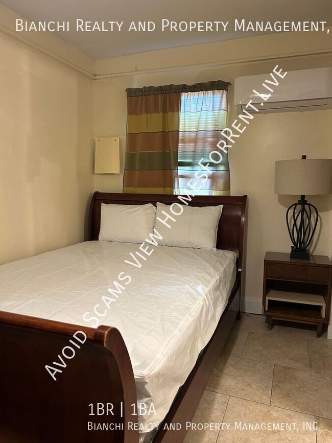 Building Photo - Furnished 1-Bedroom Apartment with Utiliti...