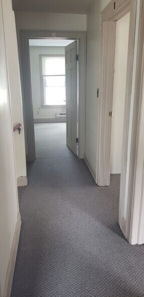 Hallway upper level to 3 bedrooms and bath - 1016 S Franklin St