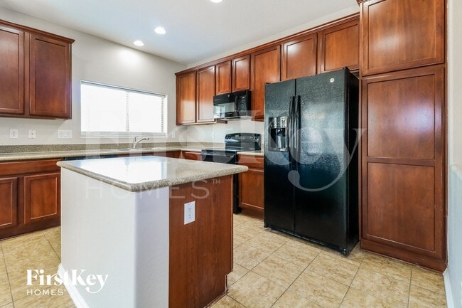 Building Photo - 10946 W College Dr