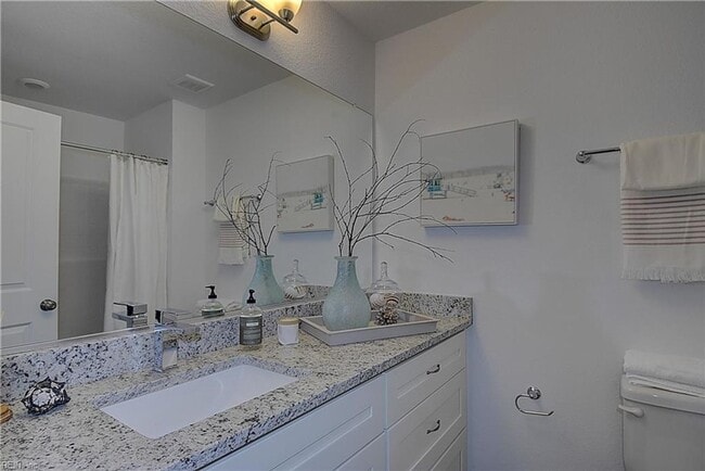 Building Photo - Three Bedroom Available