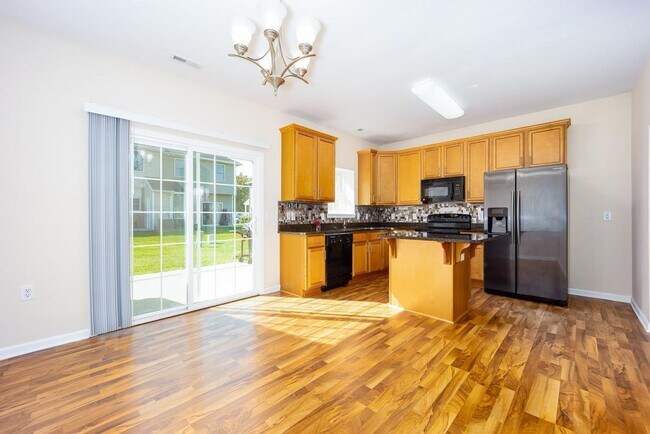 Building Photo - Liberty Square Townhouse with Upgrades!