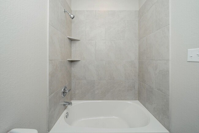 Building Photo - Live, love, and grow in this charming townhome!