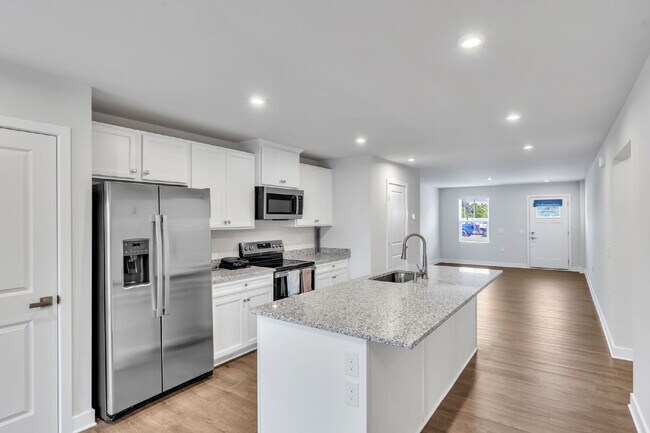 Building Photo - Modern Comfort: 3 Bed, 2.5 Bath Townhome + Primary on Main $2,050/mo rent