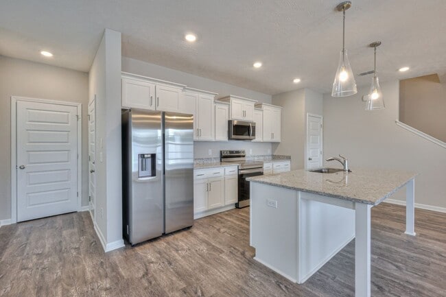 Building Photo - Brand New Luxury Townhome! 3 BR, 2.5 BA, 2 Car Garage, Pool, Dog Park, and More!