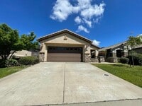 Building Photo - Fireplace in Living Room, Backyard Patio, Hardwood and Laminate Flooring