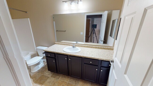 Building Photo - First Floor Rear View Three Bedroom in a Gated Community!