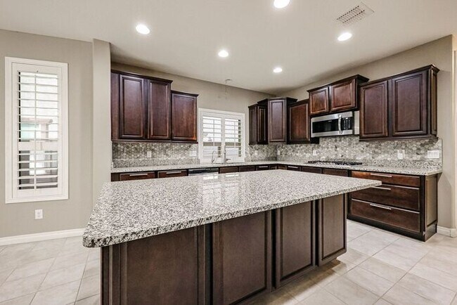 Building Photo - COMING SOON! Great Location!Stunning 6-bedroom Plus 7, 4.5-bathroom home located in Chandler