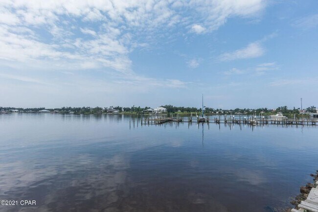 Building Photo - Enjoy this view from your balcony at  Bayou Pointe Villas