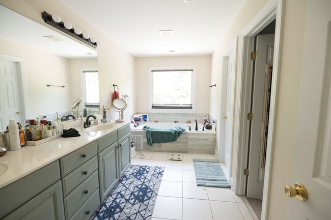 Building Photo - Spacious & Striking 3-story brick Executive 4 bedroom 4.5 bathroom home in Oak Ridge NC + Lawn ca...