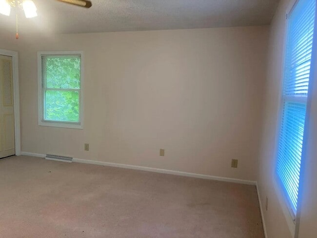 Building Photo - Beautiful Duplex Located in Serene, Wooded...