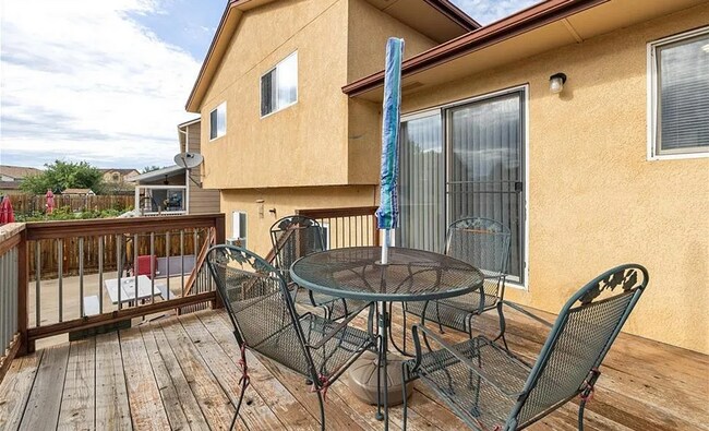Building Photo - Spacious 5-Bedroom Home with Bonus Entertainment Room & Low-Maintenance Yard