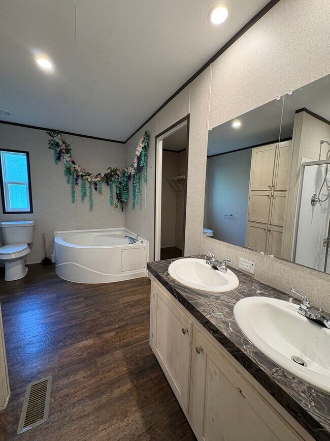 Building Photo - Huge 4 bedroom/2 bathroom double-wide in Peaceful Area of Keithville!