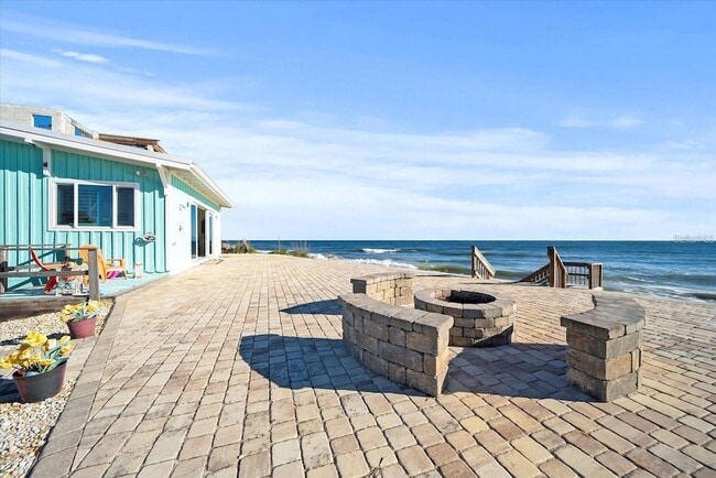 Building Photo - 3161 N Ocean Shore Blvd