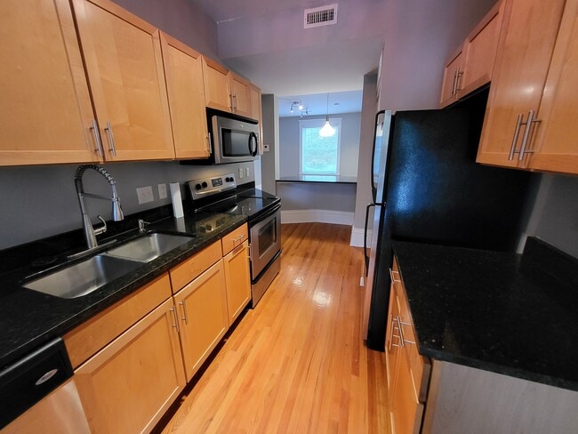 Building Photo - 6126 Washington Blvd Unit Apt 102