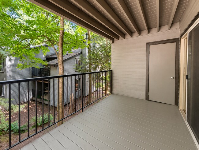 Building Photo - Modern Wooded Condo with Upgraded Kitchen & Private Deck