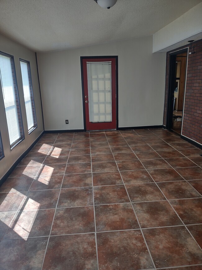 Sunroom Accessible from Living room and back yard. - 120 Arrow Lands Trl