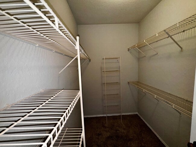 Building Photo - Spacious 2 Bed / 2 Bath Second-Floor Condo at Grand Reserve at Kirkman Park