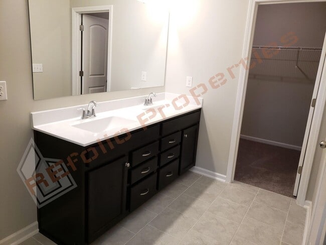 Building Photo - Beautiful Luxury 3 Story 3 Bedroom Townhome with 1st Floor Guest Suite, Attached 2 Car Garage, Co...