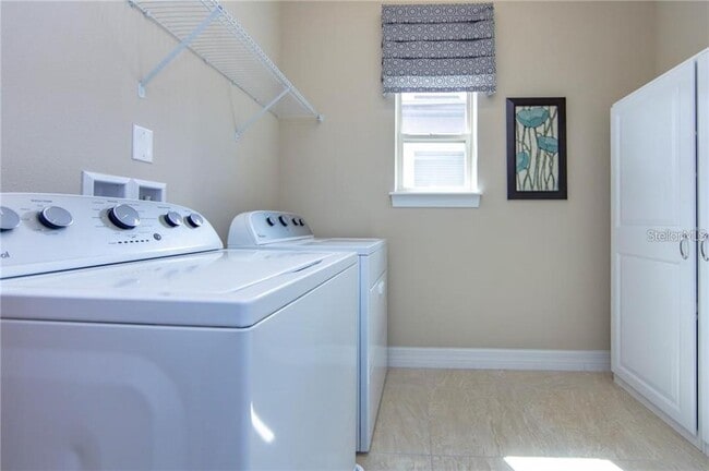 Building Photo - 7112 Enchanted Lake Dr