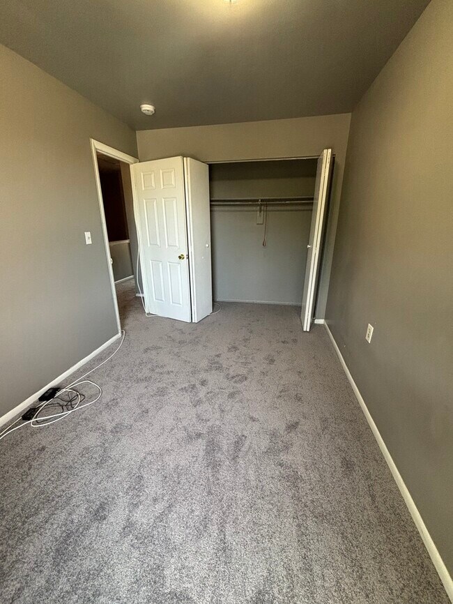 Building Photo - 2 Bedrooms Plus Den