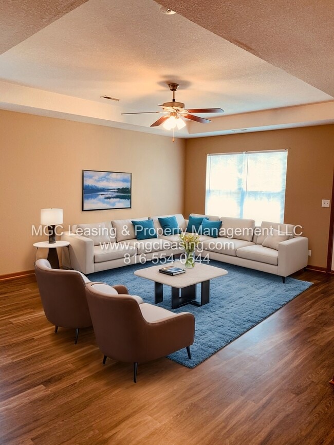 Building Photo - Charming Brick Ranch Duplex in the Heart of Lone Jack - Ready Now