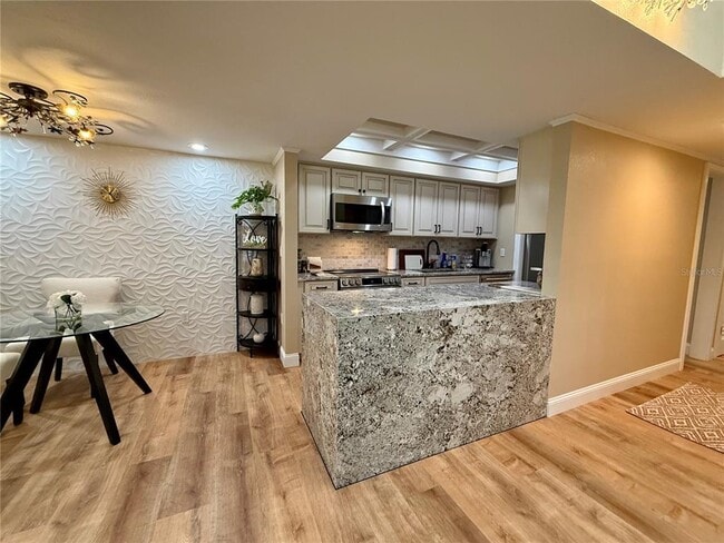 Building Photo - 6861 Woodwind Dr