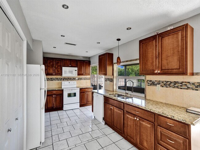 Building Photo - 8550 NW 27th Pl