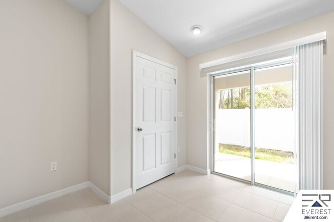 Building Photo - FULLY FENCED, LIKE- NEW 3/2/1 TOWNHOUSE ON A CUL DE SAC IN BEAUTIFUL SEMINOLE WOODS