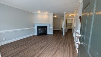 Living room with gas fireplace - 318 Olde Towne Dr