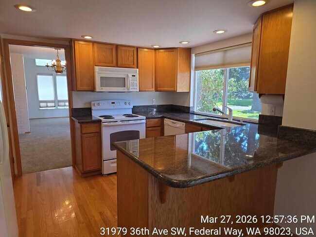 Building Photo - Twin Lakes life on a golf course -4 level home -  4 bedroom 2.5 bathroom with 2 car garage - Move...