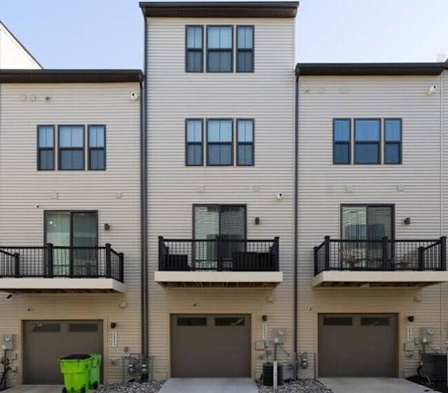 Building Photo - Available Now! Discover urban living at its finest in this 4-level gem!