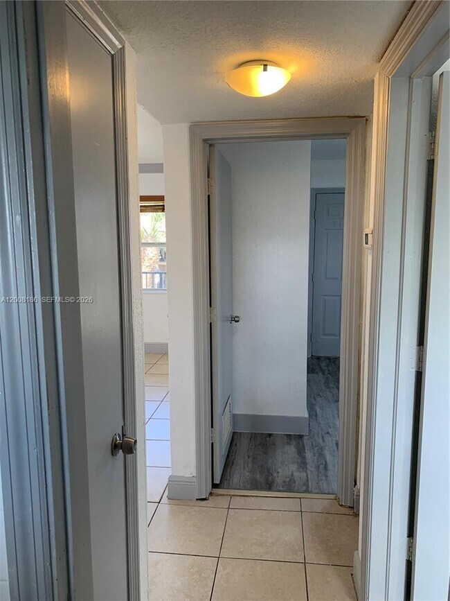 Building Photo - 241 S Royal Poinciana Blvd