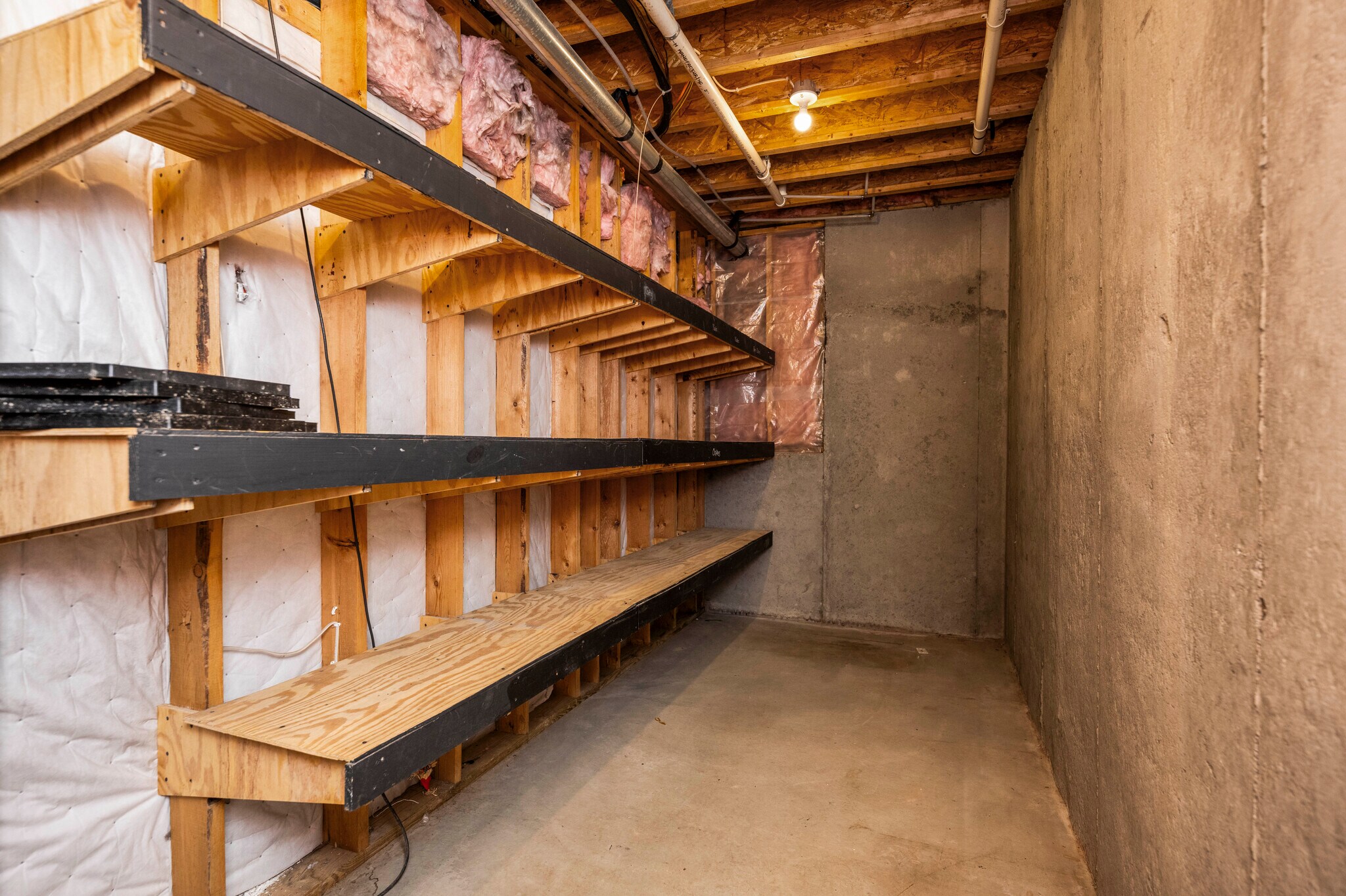 Basement with 250 feet of shelved storage. - 393 Hays Blvd